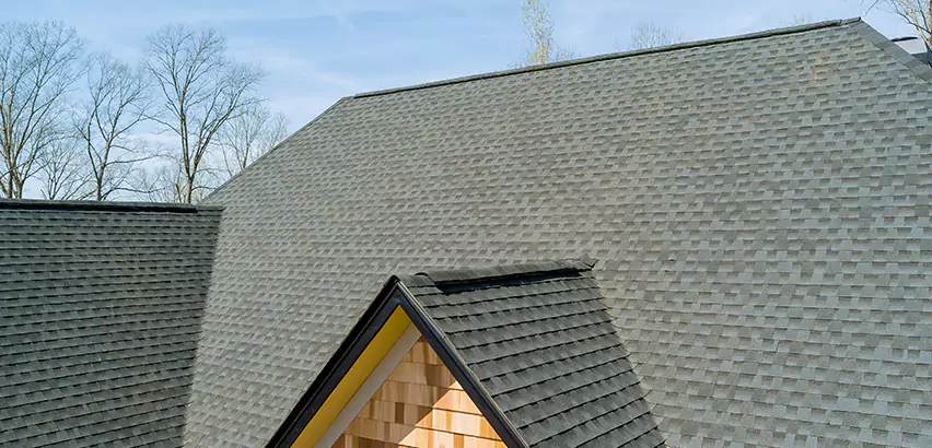 Replacing Vinyl Siding With Cedar Shingles in Norman
