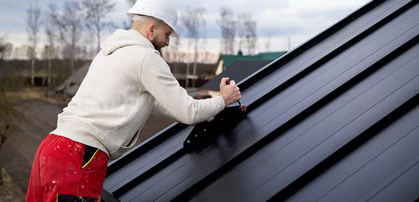 Tin Roof Ridge Cap Installation in Norman