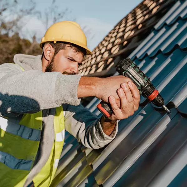 Why Norman Property Owners Choose Norman Roofing Pro for Metal Roof Replacement?